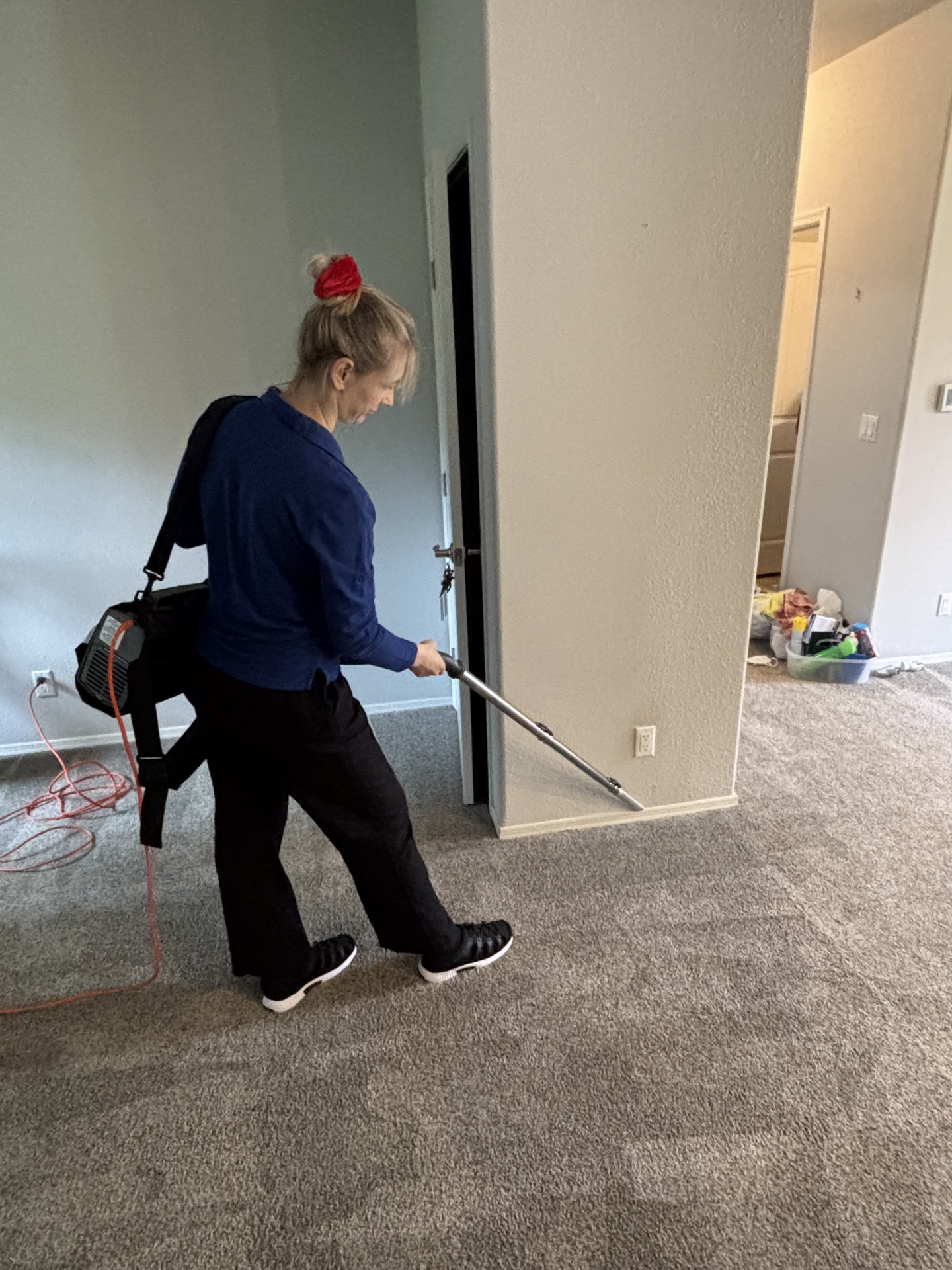 Vacuuming carpet